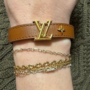 Brown Louis Vuitton leather bracelet with gold tone hardware